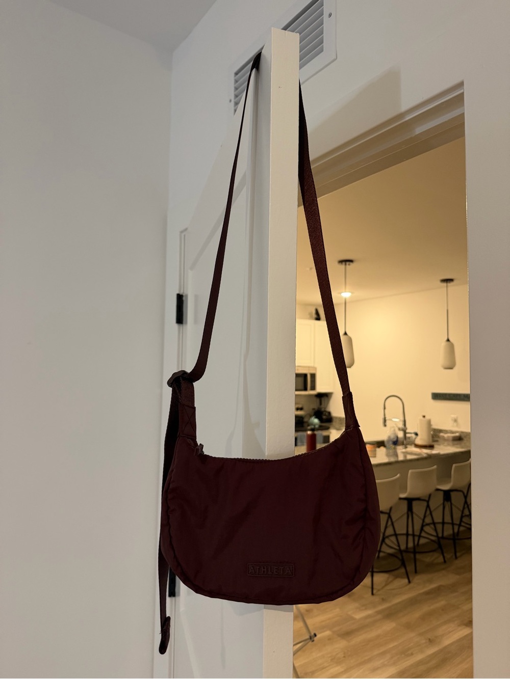 Athleta Women’s mini crossbody - maroon